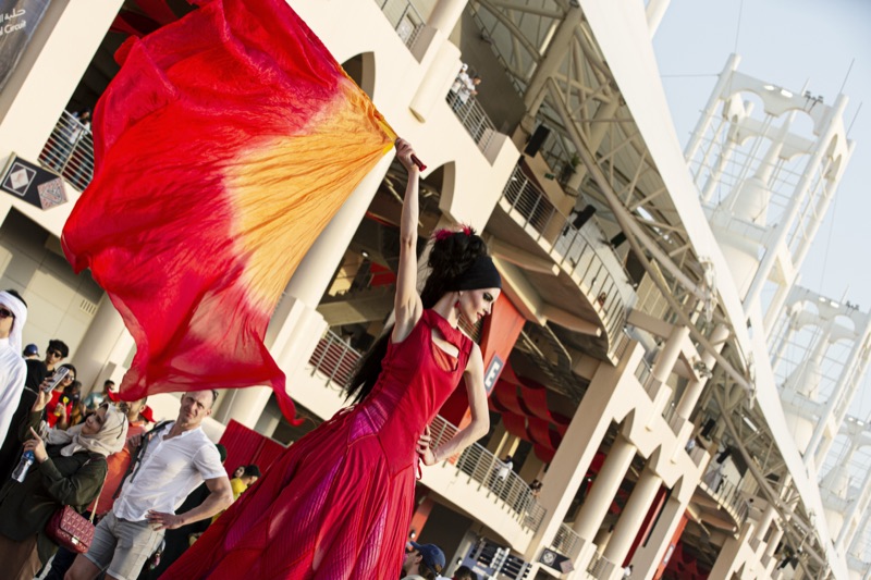 Flag dancer in red, Bahrain F1 weekend
