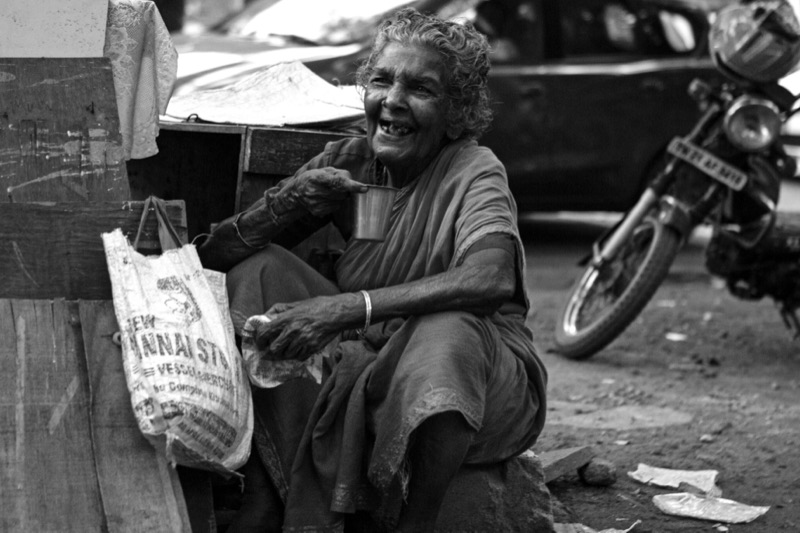 A laughing woman on the street, Chennai, India