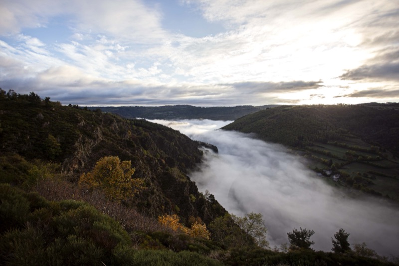 Mist filling a valley at sunrise